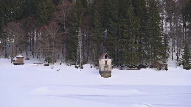 A winter of magic and mystery. Lake Predil in winter. Tarvisio.