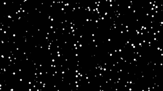 Dust specks and microscopic white flakes flickering while drifting slowly on black background cinematic texture