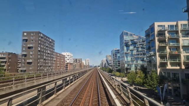Copenhagen Metro Driver's View on Elevated Track Through Urban District