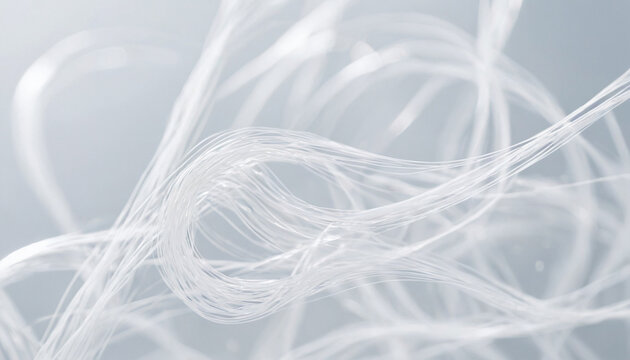Macro detail of delicate transparent white silk threads or glass fibers