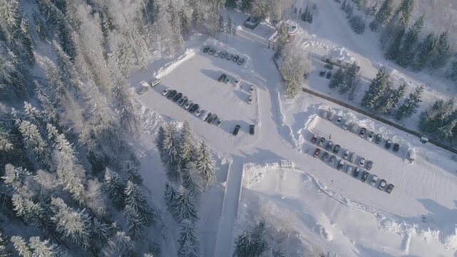 Aerial drone pull back over car park