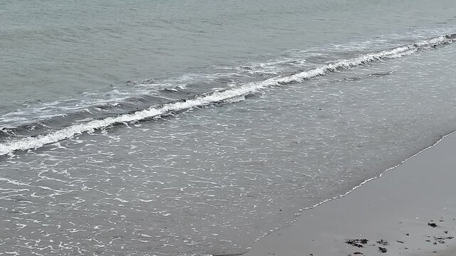 Aerial View of Linear Wave Patterns Along Shoreline at Nagahama, Ishinomaki, Japan
