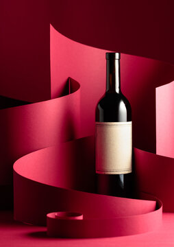 Bottle of red wine with old empty label.