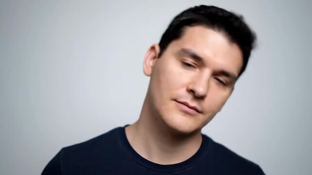 Close-up footage of men's head tilt, male multi-angle facial expressions