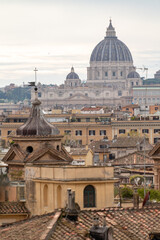 Obraz premium City view on roofs and churches of Rome from panoramic route near villas Borghese and Medici, walking in Rome in spring evening, soft sunset lights, guided tour