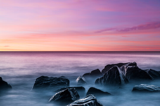 Sonnenuntergang am Meer mit Graufilter Fotografie