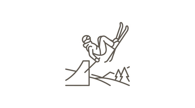 Skier jumping from kicker ramp with mountain peaks background.