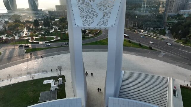 Panoramic aerial drone view of modern Central Park, coastal boulevard and Caspian Sea in Baku, Azerbaijan