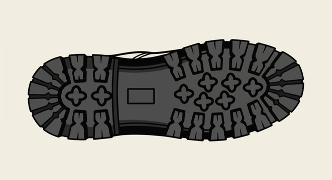 Close-up view of a heavy-duty boot sole with a thick tread pattern