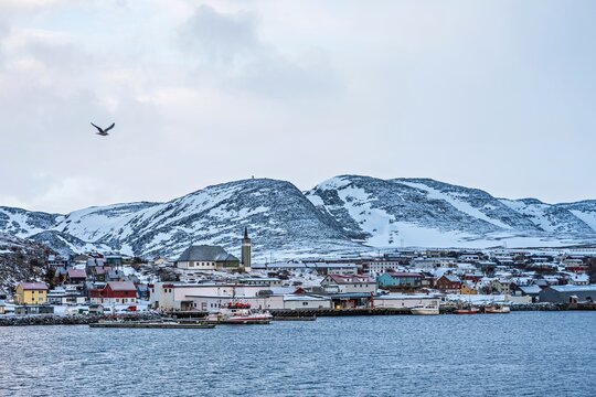 Mehamn town in Norway with church and colorful houses.
