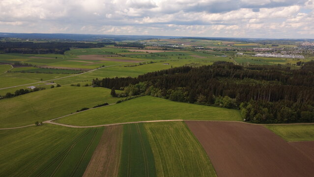 Aerial drone view of colorful farmland fields and rural countryside