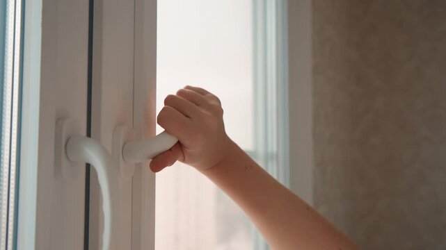 Inspect door latch. Checking lock and seal thoroughly. Examining hinges and latch for drafts carefully. Interior scene displaying maintenance procedures and inspection routines