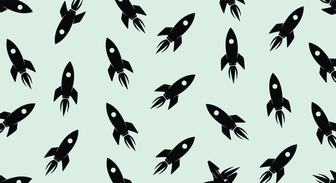 Repeating pattern of black rocket ship silhouettes on a pale mint green background for space exploration themed designs.