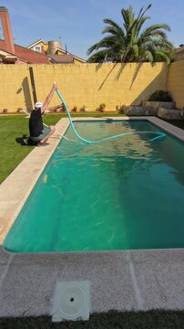 Priming Pool Pump by Filling Vacuum Hose During Swimming Pool Maintenance in 4K