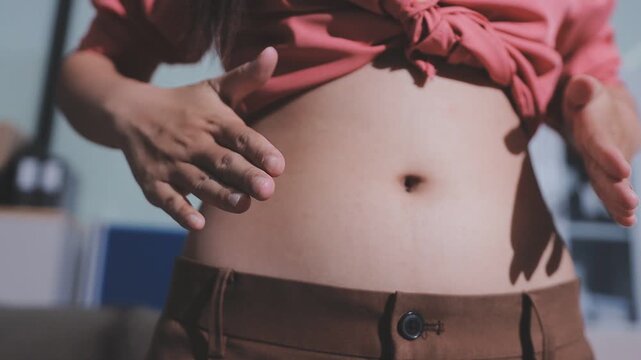 fat woman, fat belly, chubby, obese woman hand holding excessive belly fat with measure tape, woman diet lifestyle concept