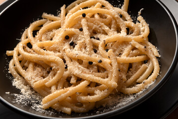 Naklejka premium Pici Senesi con cacio e pepe, Pasta Italiana 
