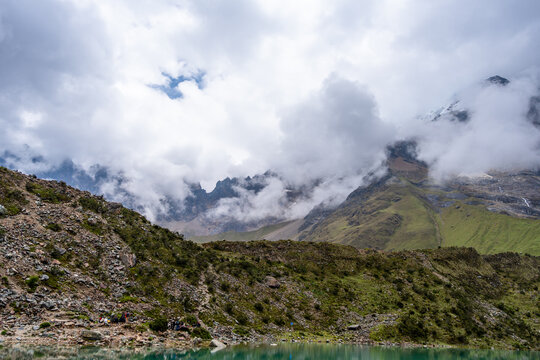 Emerald waters of Laguna Humantay surrounded by Andean mountains in Peru