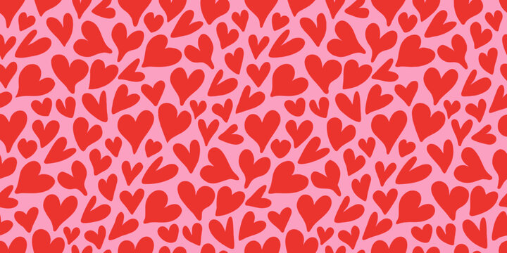 Red hearts seamless pattern on pink background repeating romantic design for textiles