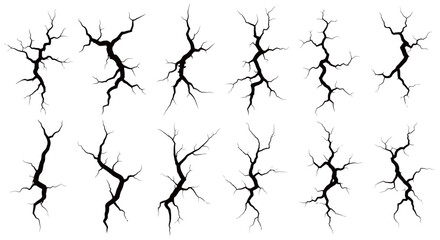 Obraz premium Set of Ground Crack Silhouettes Breaking Surface for Earthquake, Damage, and Structural Failure Graphic Design Elements