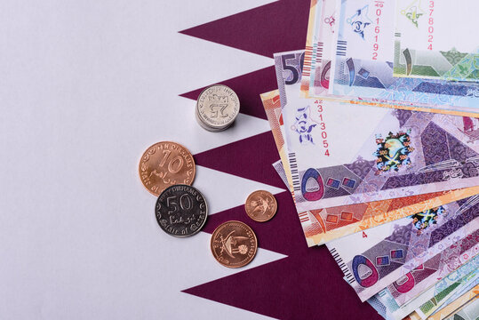 Qatar paper money, the Qatari riyal as a tool for financial transactions and trade. Qatari money