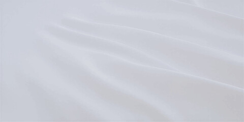 Obraz premium A smooth white silk and satin fabric background with a soft textured surface pattern that resembles blank paper or winter snow