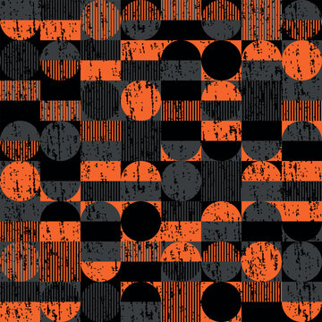 Vector seamless geometric pattern in black, grey and orange colors made of rectangles with vertical hatching and circles with small paint splashes and specks.