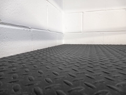 Black non-slip rubber flooring. Black rubber underlay to protect the surface and prevent slipping.
