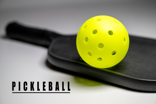Pickleball and paddle. Pickleball is America's fastest growing sport. 