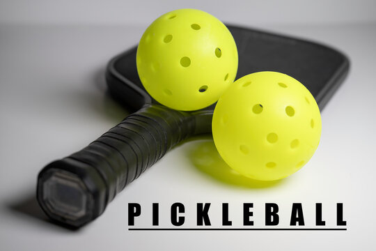 Pickleball and paddle. Pickleball is America's fastest growing sport. 