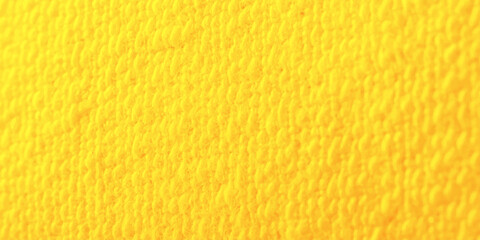 Naklejka premium Vibrant bright yellow textured paper background macro view close-up detailed blank clean surface for design layout