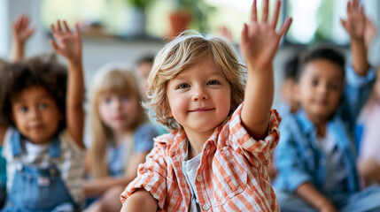 Fototapeta premium Close-up of diverse elementary students sitting on the floor with hands raised in a classroom, floor learning concept, inclusive classroom photography, student participation