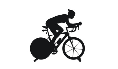 Naklejka premium Athlete uses a professional road bicycle for intensive time trial training sessions during day.