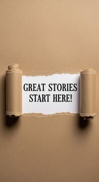 Torn Paper Revealing Inspiring Message Great Stories Start Here.