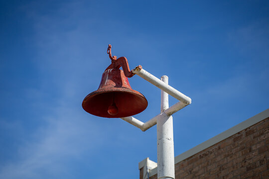 Close Up of Siren Alarm Bell for Fire Station With Blue Sky in Rural Town