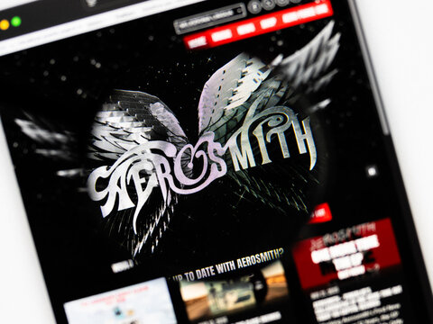 Milan, Italy 2026, 20 Apr Closeup of Aerosmith website on a laptop screen. Aerosmith logo under a magnifying glass.