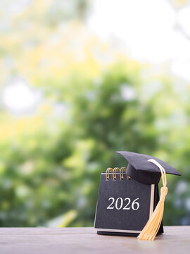 Study goals, 2026 Desk calendar with graduation hat. The concept for Resolution, Goal, Action, Planning, and manage time to success graduate.