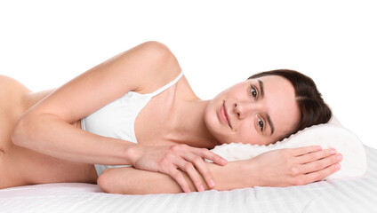 Naklejka premium Woman lying on bed with orthopedic pillow against white background