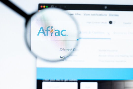 Milan, Italy 2026, 20 Apr Closeup of Aflac website on a laptop screen. Aflac logo under a magnifying glass.