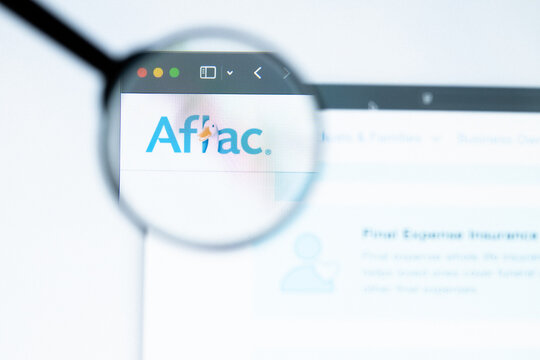 Milan, Italy 2026, 20 Apr Closeup of Aflac website on a laptop screen. Aflac logo under a magnifying glass.