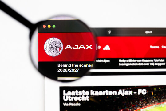 Milan, Italy 2026, 20 Apr Closeup of Ajax Amsterdam website on a laptop screen. Ajax Amsterdam logo under a magnifying glass.