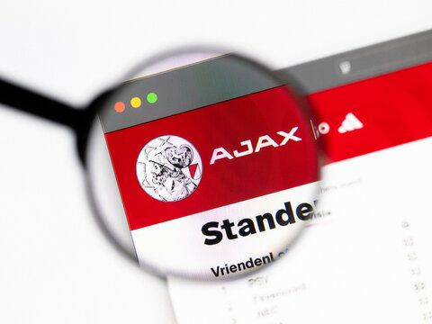 Milan, Italy 2026, 20 Apr Closeup of Ajax Amsterdam website on a laptop screen. Ajax Amsterdam logo under a magnifying glass.