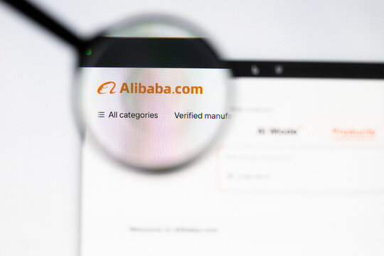 Milan, Italy 2026, 20 Apr Closeup of Alibaba website on a laptop screen. Alibaba logo under a magnifying glass.