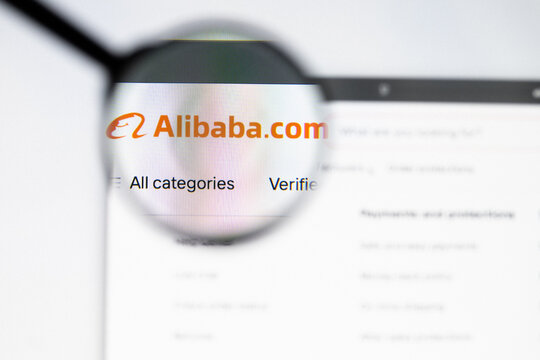 Milan, Italy 2026, 20 Apr Closeup of Alibaba website on a laptop screen. Alibaba logo under a magnifying glass.
