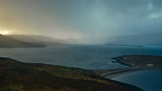 storm clouds over the sea on a dark winter's day in the scottish highlands