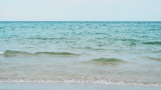 waves crashing on beach