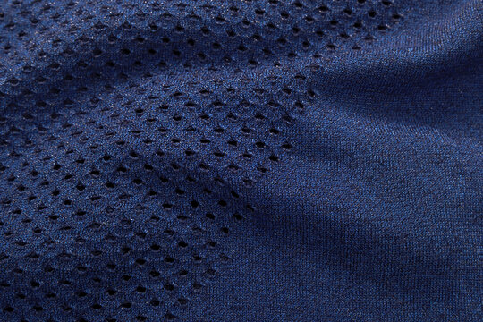 
A close-up of fabric background in blue and black