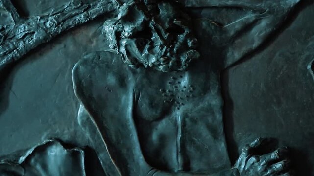 A close up shot of the historic bronze relief doors depicting religious figures, transitioning to a low angle view of the majestic columns at Saint Peters Basilica, Rome.

