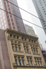 Naklejka premium historic building facade designed by Samuel George Curry in Renaissance Revival style now incorporated into Scotia Plaza, 40 King St W, Toronto