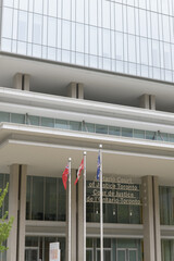 Naklejka premium The Ontario Court of Justice at 10 Armoury Street in Toronto, designed by Renzo Piano Building Workshop with NORR for Infrastructure Ontario in a contemporary high-tech modernist style, completed 2023
