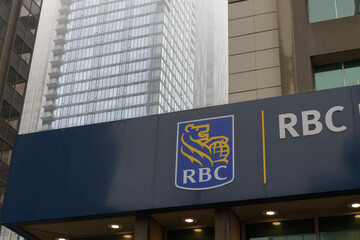Naklejka premium close-up of sign outside RBC, Royal Bank, located at 2 Bloor St E, Toronto